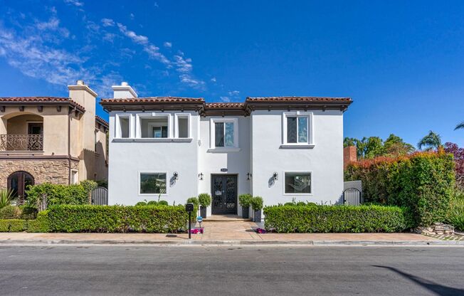 Welcome to 508 Westminster Avenue—a refined blend of Mediterranean charm, modern farmhouse elegance, and classic Newport Beach luxury, tucked away on a quiet, tree-lined street in one of the area’s most coveted neighborhoods.