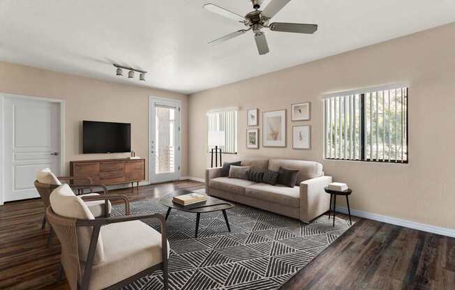 A living room with a couch, chair, and television.