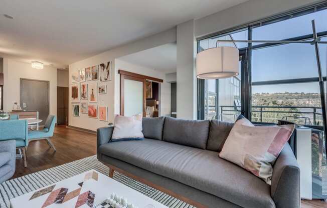 Dining Table Along Side With Living Room at Equinox, Seattle, WA, 98102