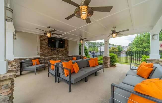 the preserve at ballantyne commons covered patio with couches