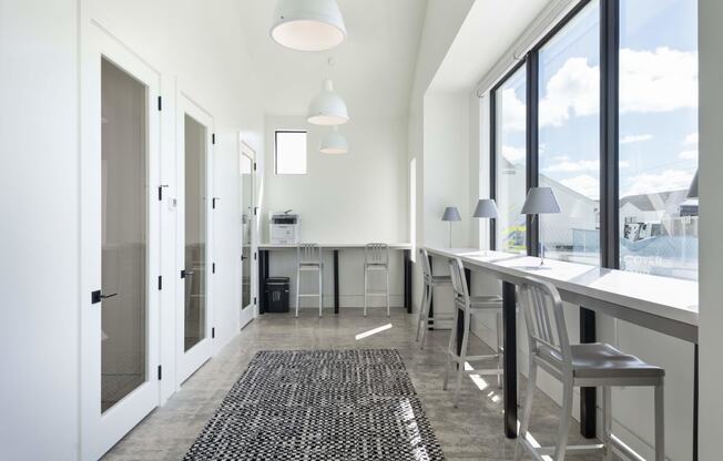 a kitchen with a long counter and a large window at Odyssey, Fort Myers, Florida
