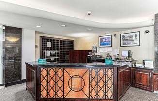 A reception desk with a black and orange design.