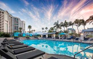 Pool With Relaxing Chairs at Towers at Costa Verde Apartments, San Diego, California