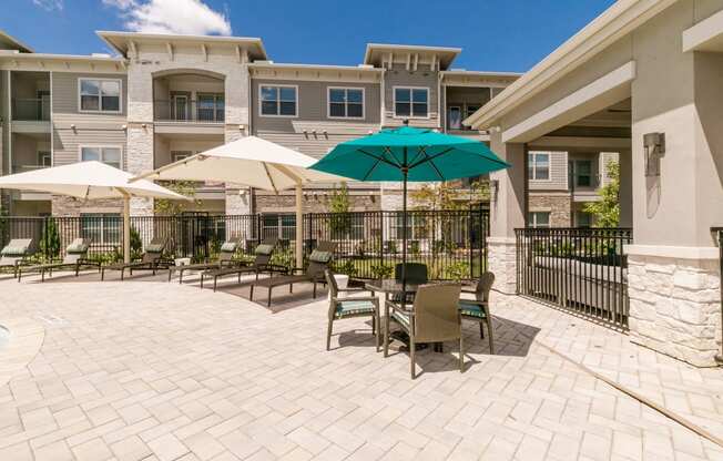 Outdoor Grill With Intimate Seating Area at Cue Luxury Apartments, Texas, 77433