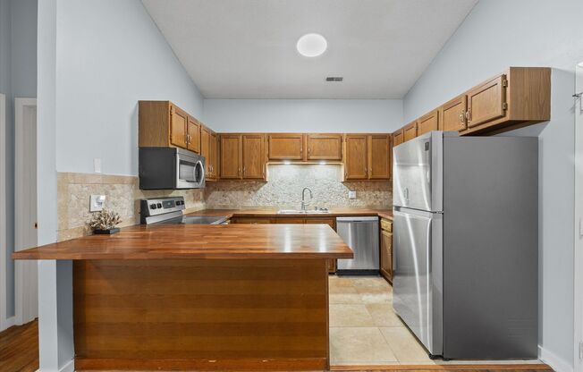 This beautifully maintained 2-bedroom, 2-bath 3rd Floor unit in Lake Wylie Woods is a Gem!