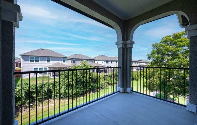 Covered balcony facing outside landscape