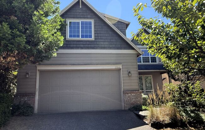 12540 NW Brimpton Court ~ Elegant Bethany Home with NEW Carpet & Fresh Paint