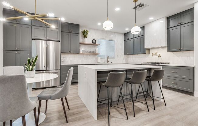 FULLY FURNISHED! Exudes sophistication with designer touches throughout