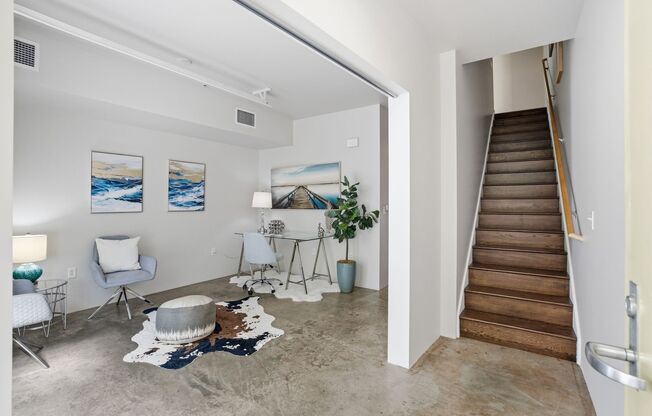1-Bedroom + Den/Office, 2-Bath Townhome with EV Charging & Secure Parking