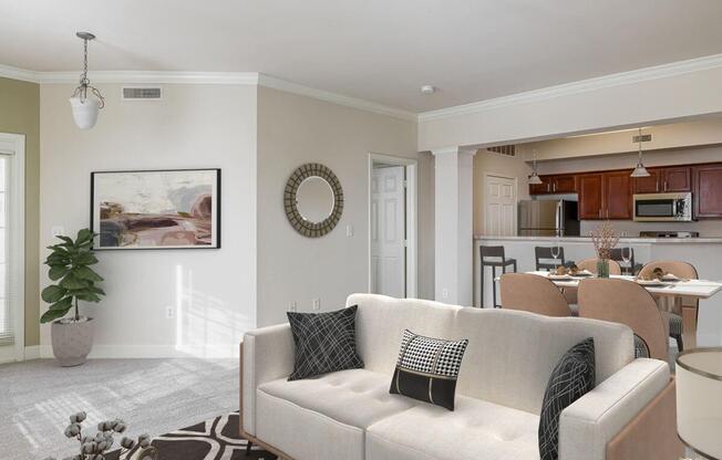 a living room filled with furniture and a flat screen tv