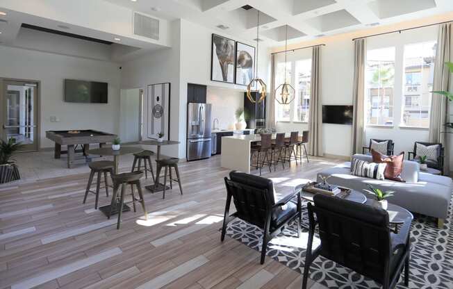 resident lounge with pool table and open kitchen at Capriana at Chino Hills, California, 91709