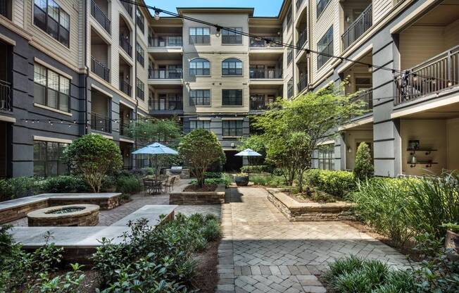 Serene Courtyard with Grills and Fire Pit