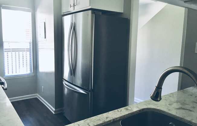 Diwhwasher, Fridge In Kitchen at Wilbur Oaks Apartments, Thousand Oaks, California