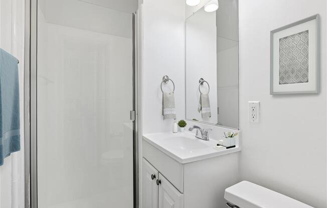 a bathroom with a sink toilet and shower at Pacific Rose, Los Angeles, CA 90034