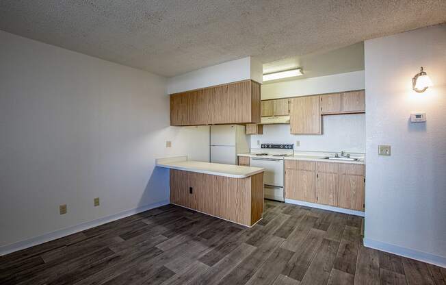 Kitchen with Breakfadst Bar at Acacia Hills Apartments in Tucson Arizona