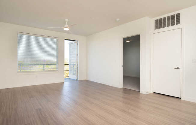 Living Room with Balcony and Hard Surface Flooring