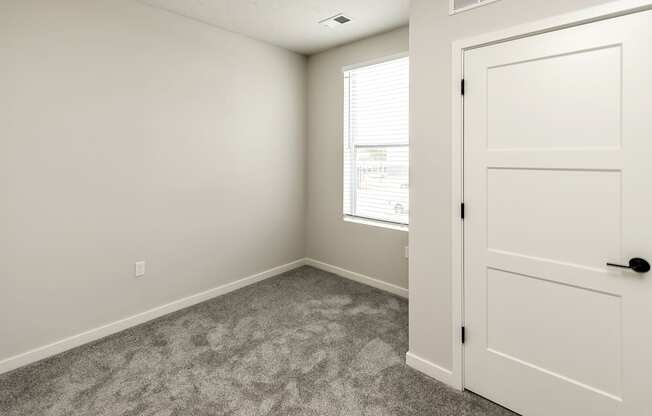 Studio, one and two bedroom apartment homes featuring stainless steel appliances, luxury vinyl floor, granite countertops, large closets and full-size washer and dryer at The Parker in Papillion, NE