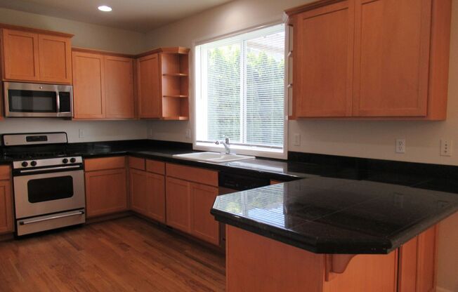 Three bedroom+den, 2.5 bath home on corner lot in Renton Highlands