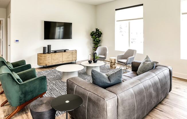 Clubhouse communal seating with TV at Hanover Flats in Bennington, NE