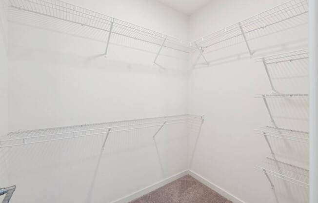 large walk-in closet with shelving