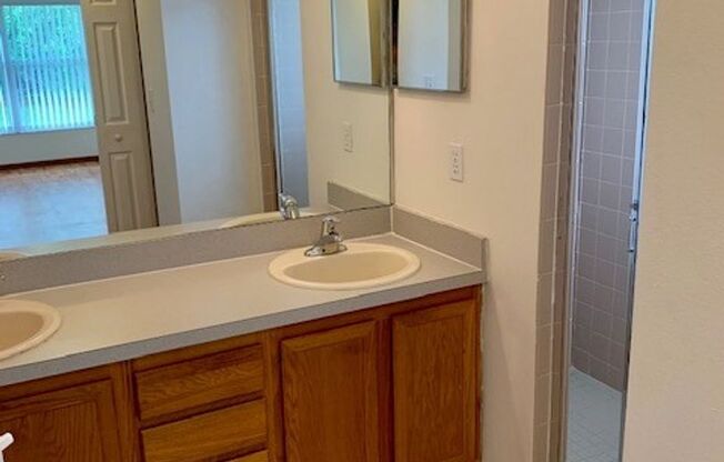 Available NOW! NEW FLOORS AND PAINT! Lovely 3/2 in Poinciana! HUGE fenced yard and NO CARPET!