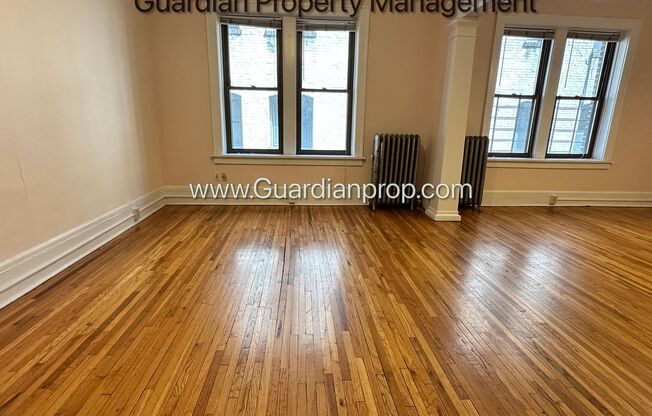 Spacious Lakes Uptown Apartment, Blocks from Both Lakes, Hardwood Floors, One Month Free