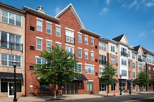 a brick apartment building on a city street