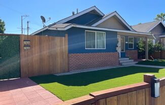 2 bedroom 1.5 bath cottage free standing home with parking in highly desirable neighborhood of Long Beach