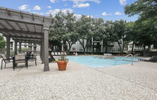 a large pool for residents to enjoy at Jefferson Creek in Irving, TX