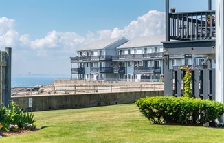 a view of the ocean and bass point from the back of the property