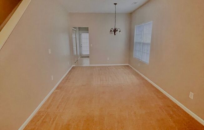 This two-story, 4-bedroom, 2-bath duplex in Fort Mill, SC sits on a corner lot
