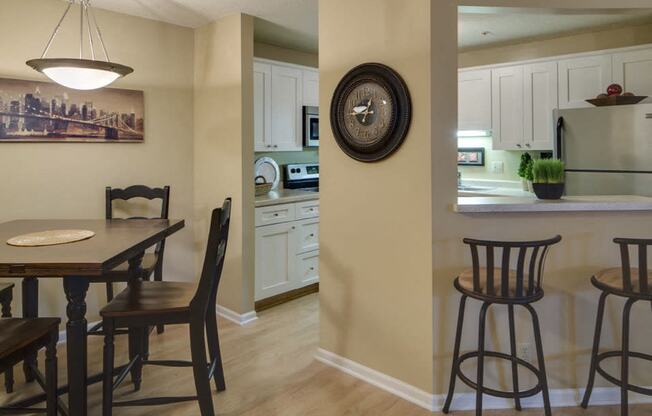 Kitchen and dining room with table and seating