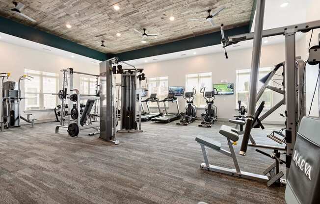 gym with cardio equipment at the bradley braddock road station apartments