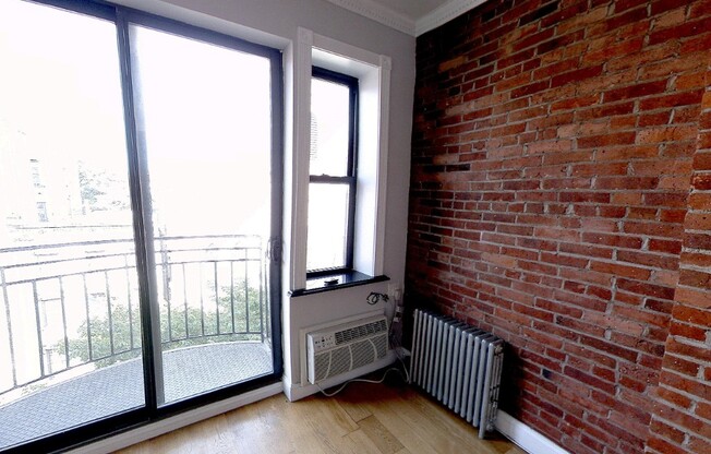 102 E 7TH ST