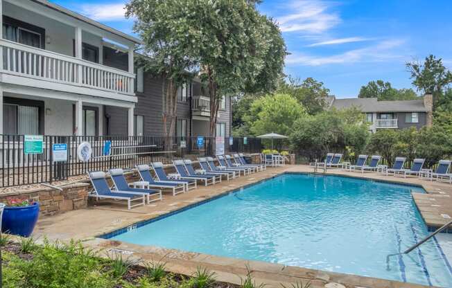 our apartments have a swimming pool with lounge chairs