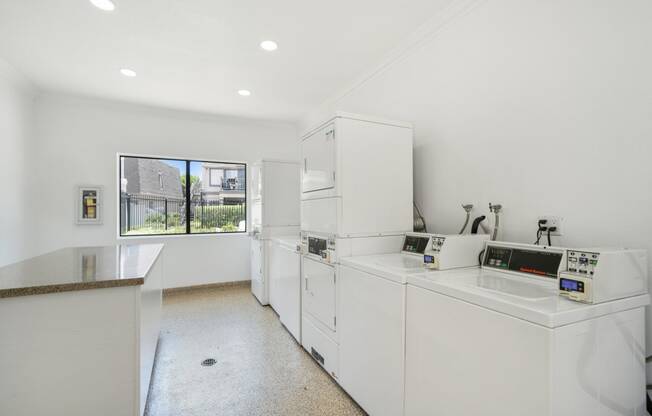 laundry room, the grand condos by edgewater one ir