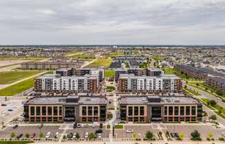 an aerial view of an urban area with buildings and cars at EagleRidge Plaza Residences, North Dakota, 58104