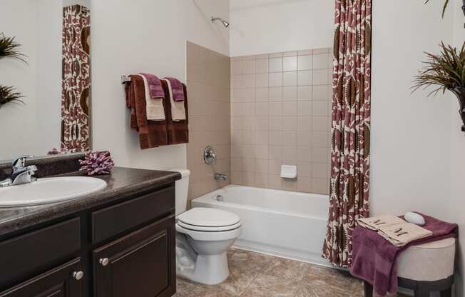 Spacious Bathroom With Tile-Style Floors