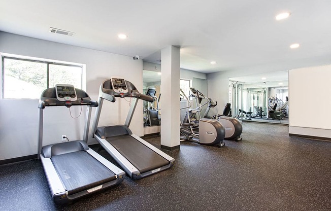 a gym with treadmills and other exercise equipment  at The Laurel, Georgia