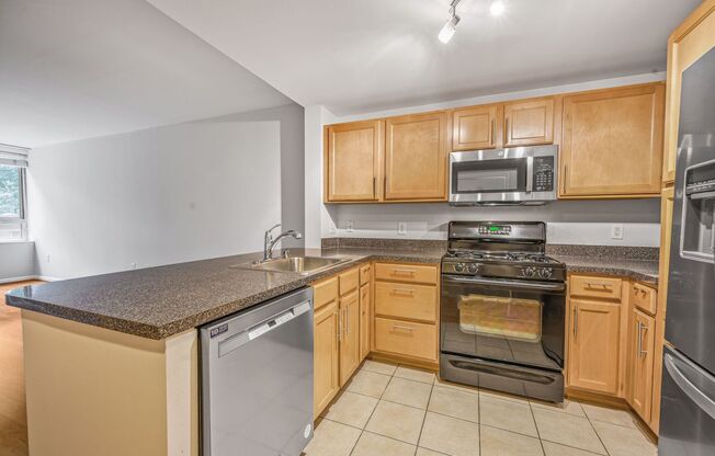 Beautifully Renovated 1BR Condo With Balcony in Amenity Rich Community with Parking!