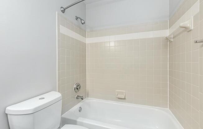a close up of a sink and a bath tub