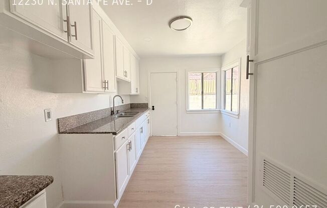 12230 N SANTA FE AVE