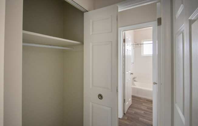 This is a photo of the bedroom closet and hallway in the 631 square foot, B-style (Ranch) 1 bedroom/1 bath floor plan at Colonial Ridge Apartments in the Pleasant Ridge neighborhood of Cincinnati, OH.
