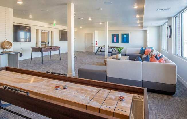 The Arlo | Game room with shuffle board, table tennis, foosball, and more
