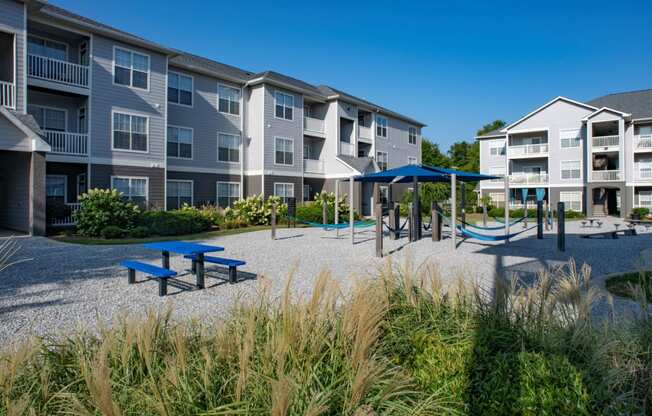 an outdoor playground at the preserve at polk apartments at The Shallowford, Chattanooga, TN