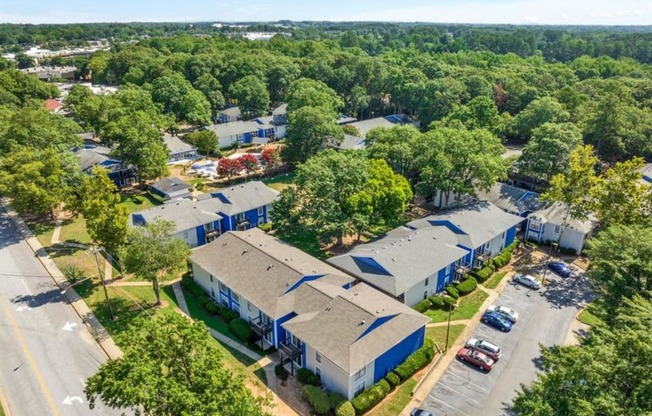 an aerial view of a group of buildings and trees