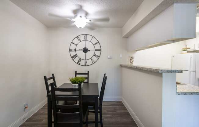 This is a photo of the dining area of the 515 square foot 1 bedroom apartment at Canyon Creek Apartments in Dallas, TX