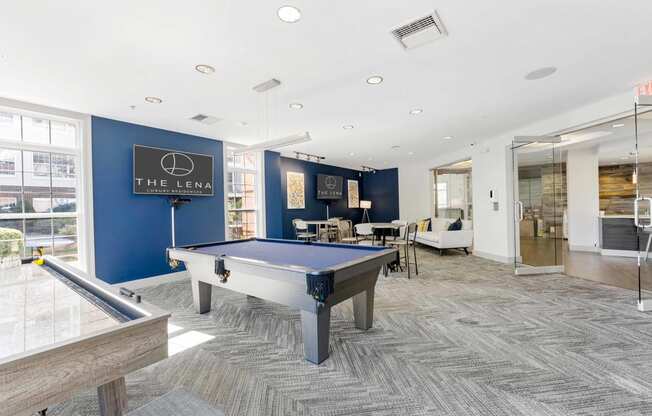 play a game of pool in our games room  at The Lena, Raritan, NJ
