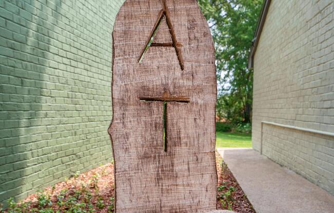 Alder Terrace Initials A T Carved in Wooden Sign