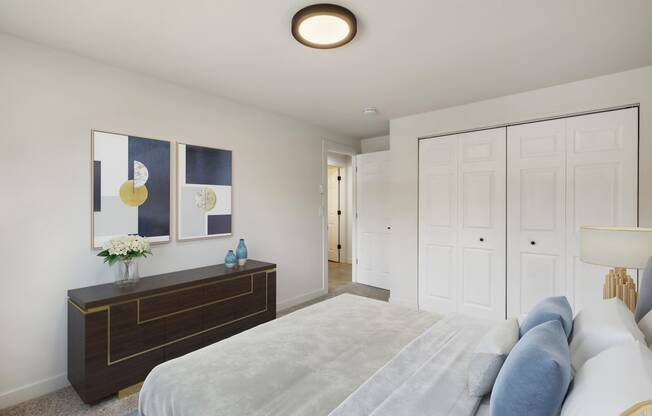 a bedroom with white walls and a large white bed  at Brix, Washington, 99362